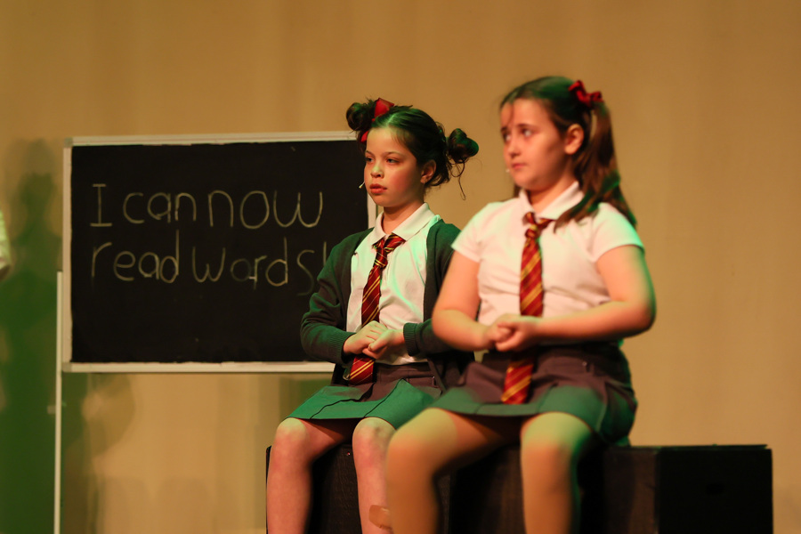 two girls with their hands put together two girls with their hands put together